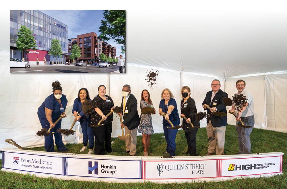 Members of the LG Health Urgent Care team shovel dirt and pose for a photo at the groundbreaking event